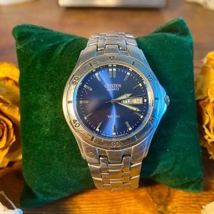 Citizen watch with blue sunburst dial